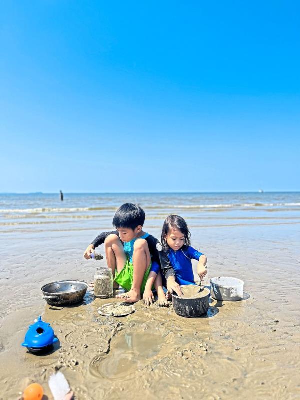 Eusuff (left) and Omar enjoy playing by the beach as it promotes physical activity, and provides a natural setting for imaginative play.  