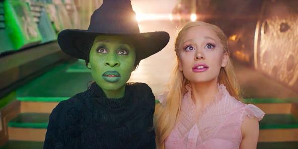 Elphaba (Cynthia Erivo) and Glinda (Ariana Grande) looking up in Wicked