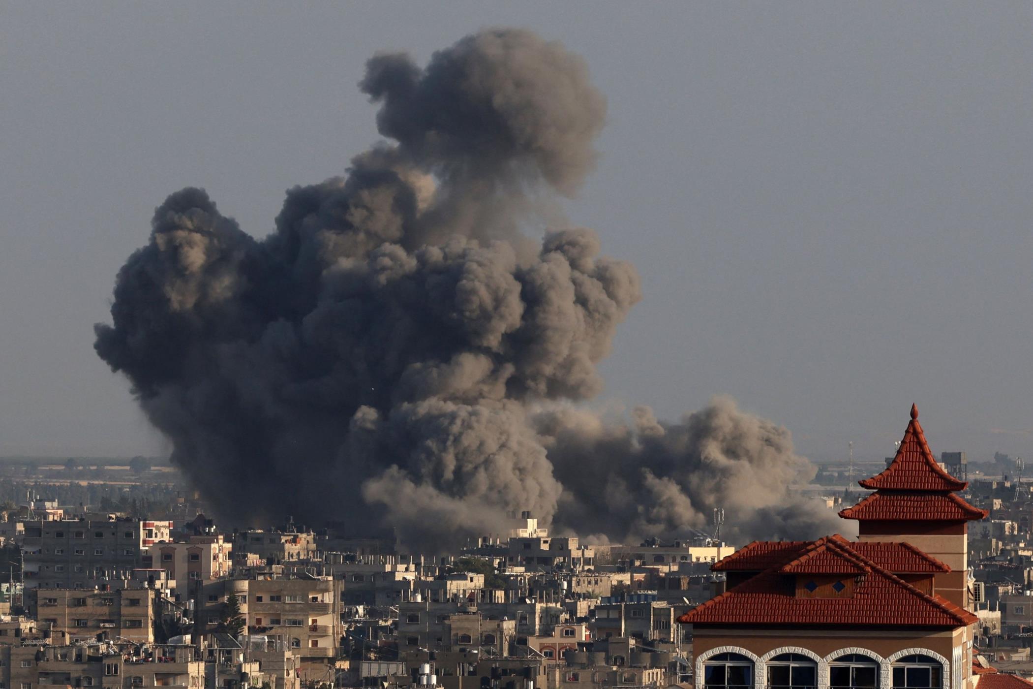 A picture taken from Rafah shows smoke billowing over Khan Youning, southern Gaza Strip, Palestine, Jan. 24, 2024. (AFP Photo)