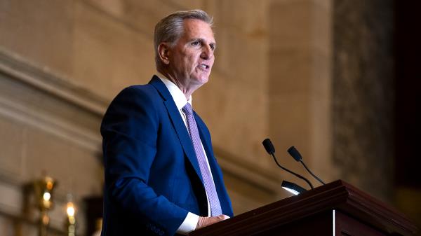 Former Speaker Kevin McCarthy speaks during a ceremony.