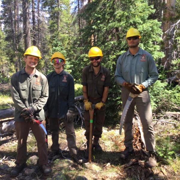 Halen Carbajal (second from right) recently finished his term of service with UCC.