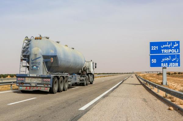 A fuel tanker truck drives along the internatio<em></em>nal highway l<em></em>inking Tunisia's southern town of Ben Guerdane to Libya