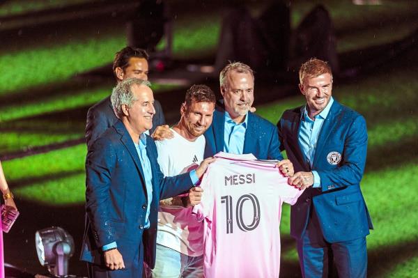 The perfect fit: Messi and Inter Miami co-owners (from left) Jorge Mas, Jose Mas and David Beckham pose with the 2022 World Cup winner’s new jersey during an event. In the span of three months, the Argentine superstar has made the eye-catching pink jersey the hottest piece of sports merchandise on the planet.