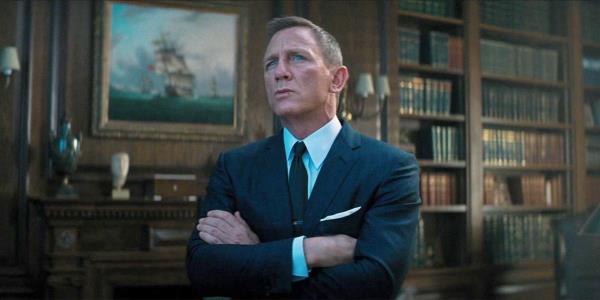 Daniel Craig looking thoughtful as James Bond in No Time to Die