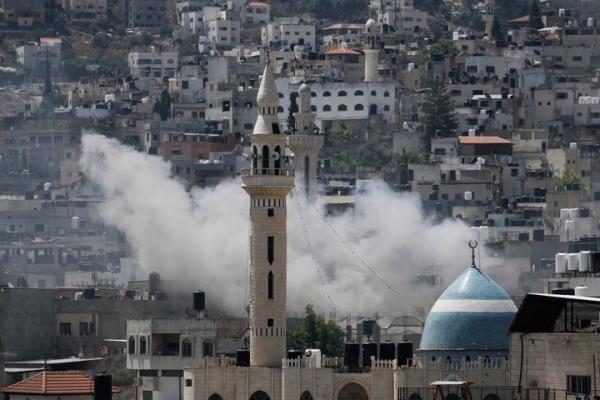 Smoke rises during an Israeli military raid of the militant stro<em></em>nghold of Jenin in the occupied West Bank, Monday, July 3, 2023. (AP Photo/Majdi Mohammed)