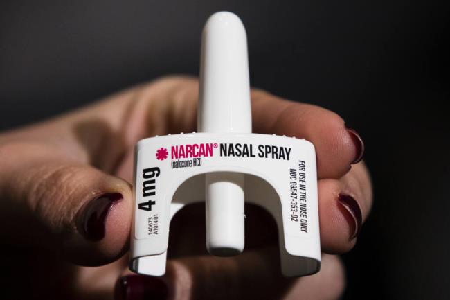 FILE - The overdose-reversal drug Narcan is displayed during training for employees of the Public Health Management Corporation (PHMC), Dec. 4, 2018, in Philadelphia. San Francisco is amid a drug overdose epidemic and could become the first in the country to require every pharmacy within its boundaries to always carry naloxone, a drug that reverses overdoses caused by fentanyl and other opioids. San Francisco Supervisor Matt Dorsey will introduce a bill Tuesday, June 27, 2023, that if approved, would require every pharmacy in the city to always have in stock at least two nasal sprays co<em></em>ntaining the drug or face fines. (AP Photo/Matt Rourke, File)