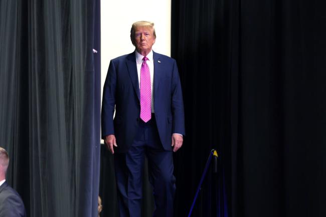 Former President Do<em></em>nald Trump walks on stage to speak at the Oakland County Republican Party's Lincoln Day Dinner, Sunday, June 25, 2023, in Novi, Mich. (AP Photo/Al Goldis)